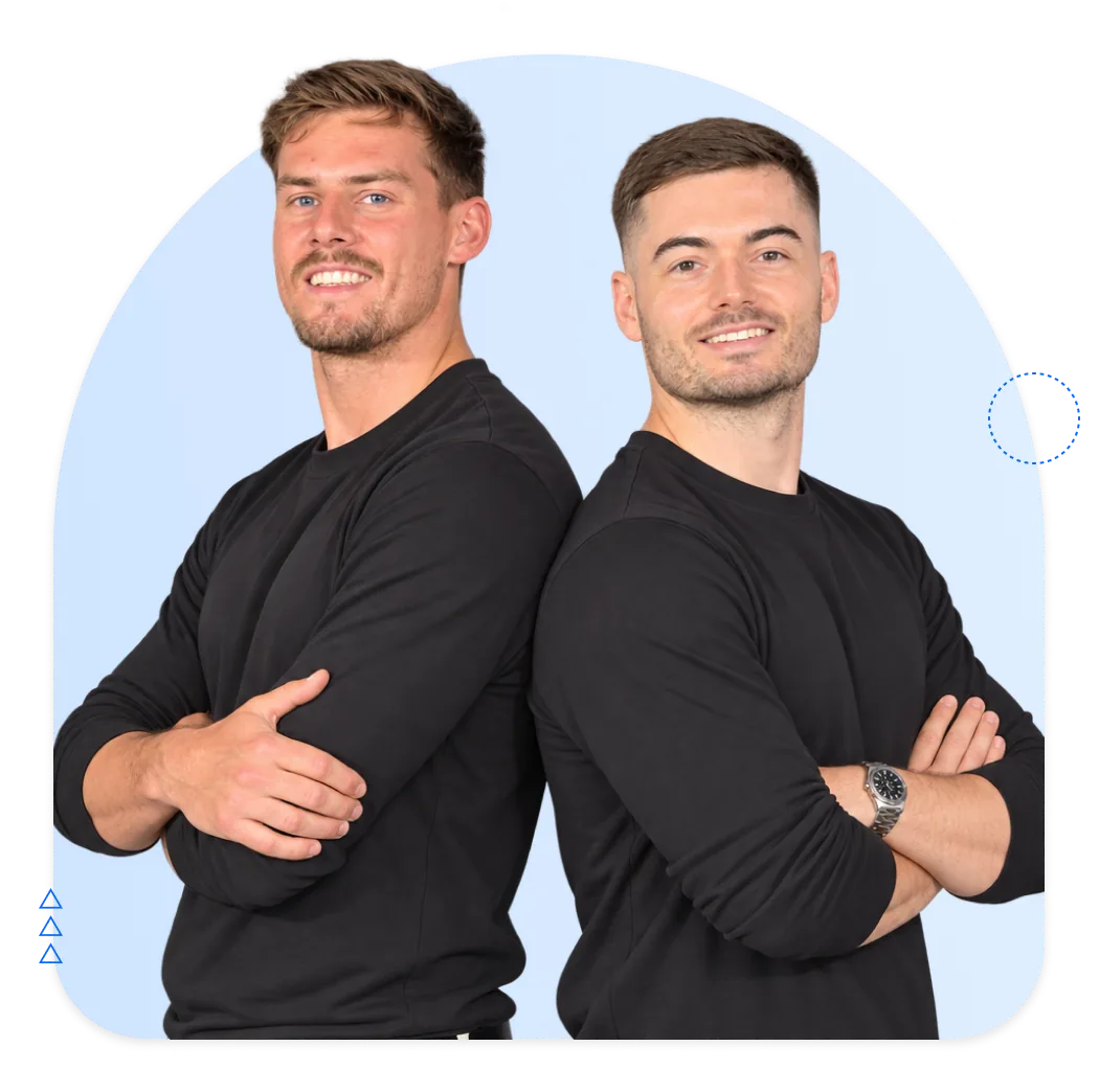 Two Salesforce consultants standing back to back with crossed arms, smiling
