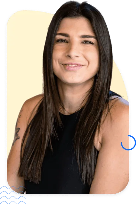 Confident marketer with long dark hair, representing account-based marketing