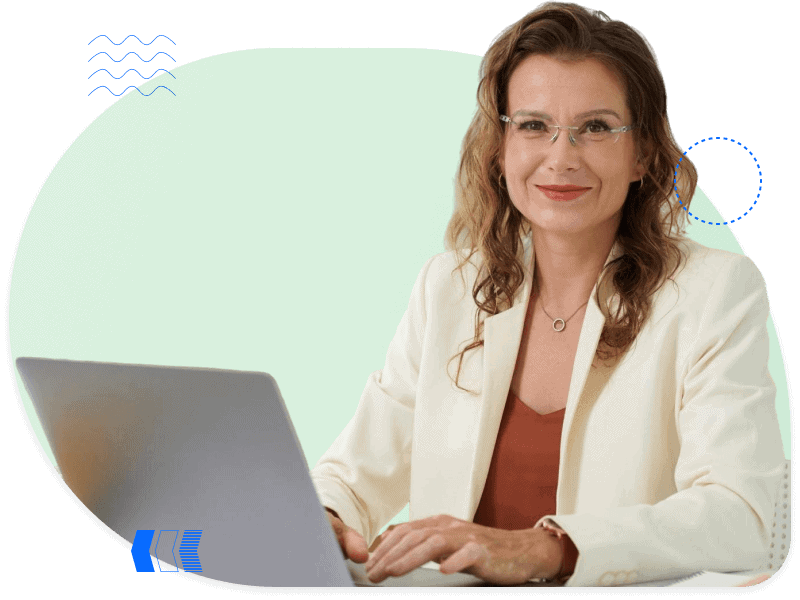 Confident woman at laptop, representing the automotive industry