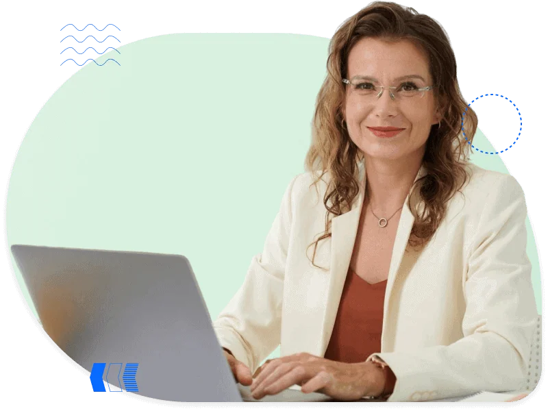 Confident woman at a laptop, representing the automotive industry