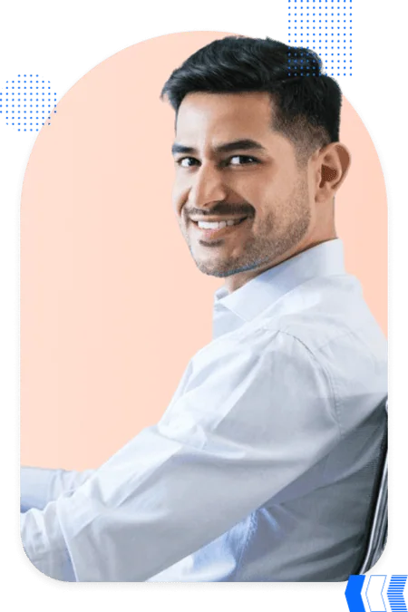 Smiling man in white shirt representing partner agencies collaborating on Salesforce projects