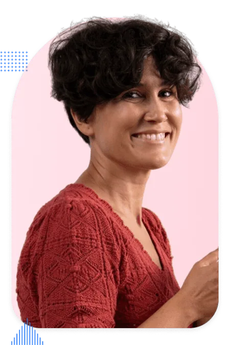 Smiling woman holding phone, representing trusted Pardot partnerships